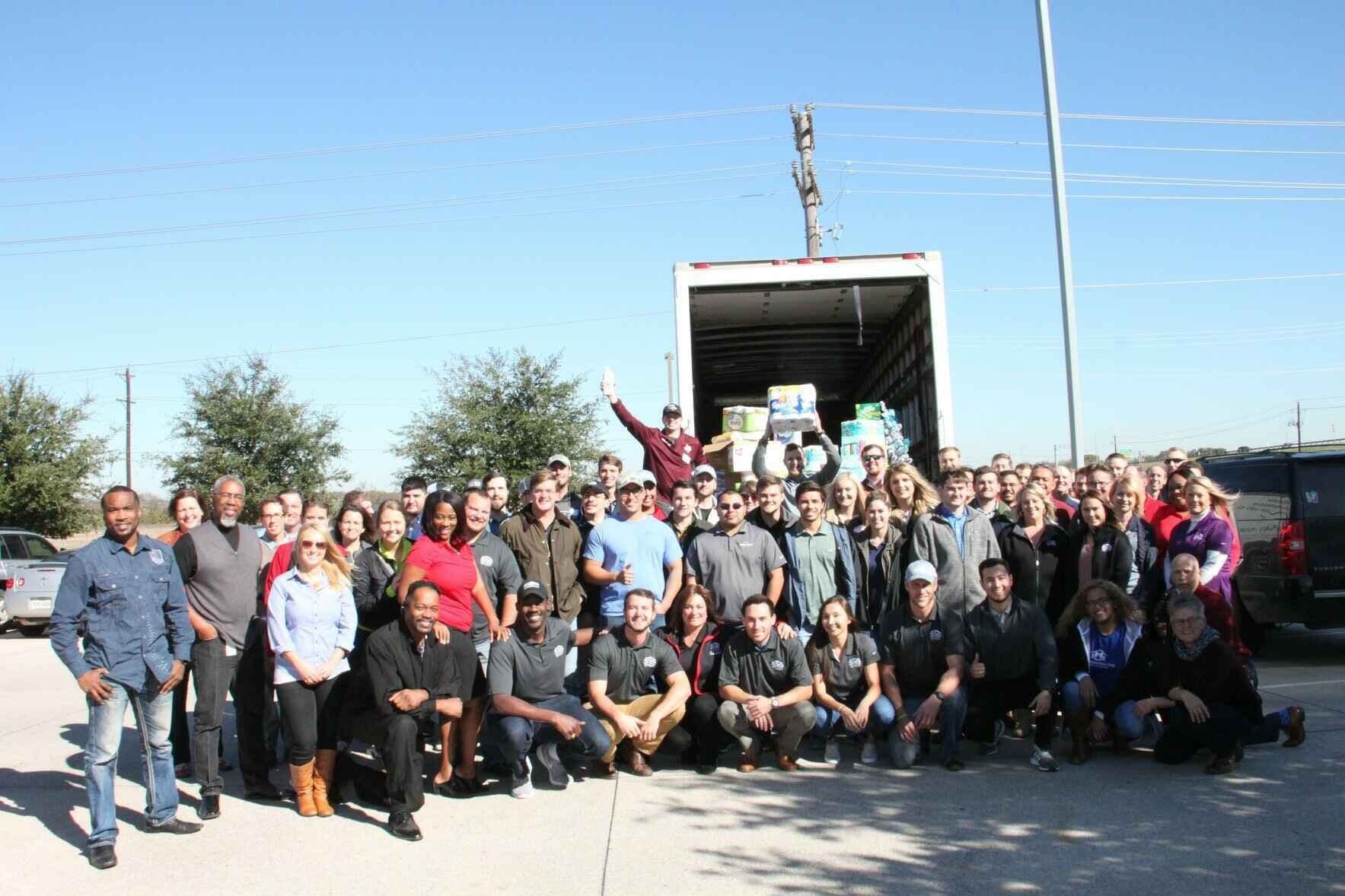 Heritage employees posing for a group photo.